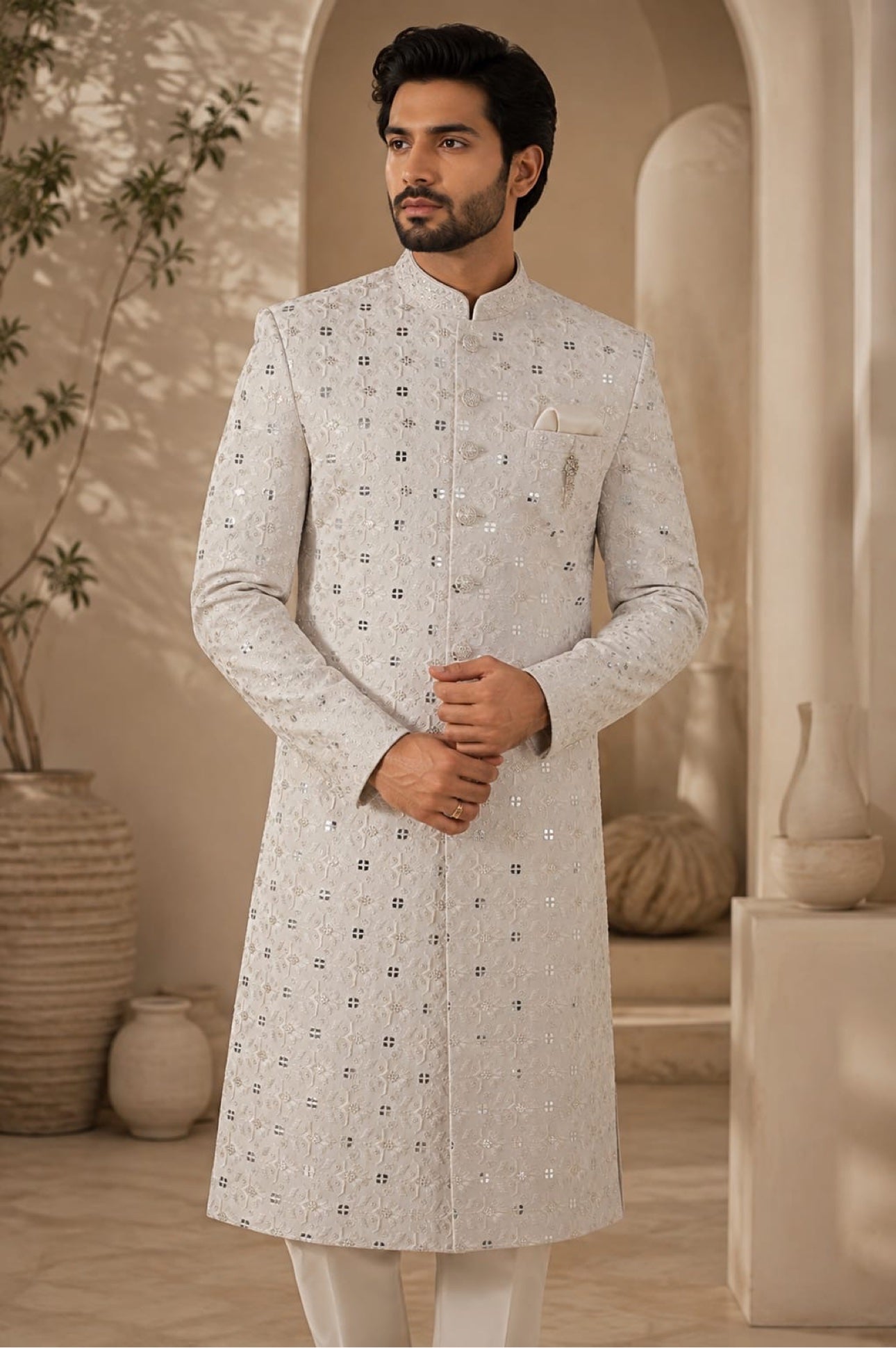 White sherwani with silver mirror work